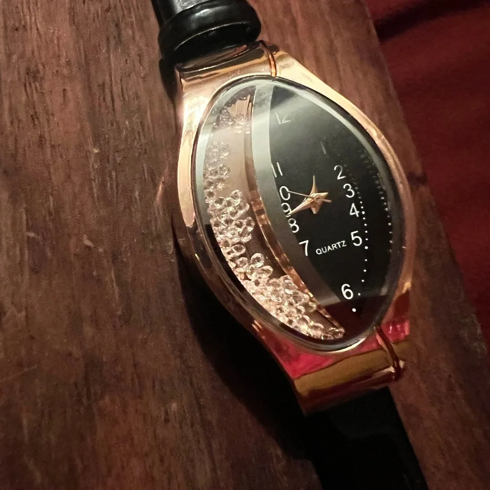 fashion watch with cz floating inside watch face ,‎ very beautiful